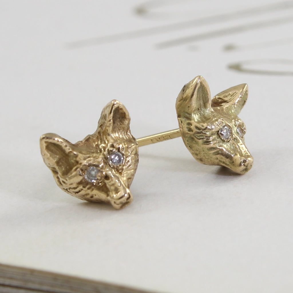 mini yellow gold fox head stud earrings with diamond eyes