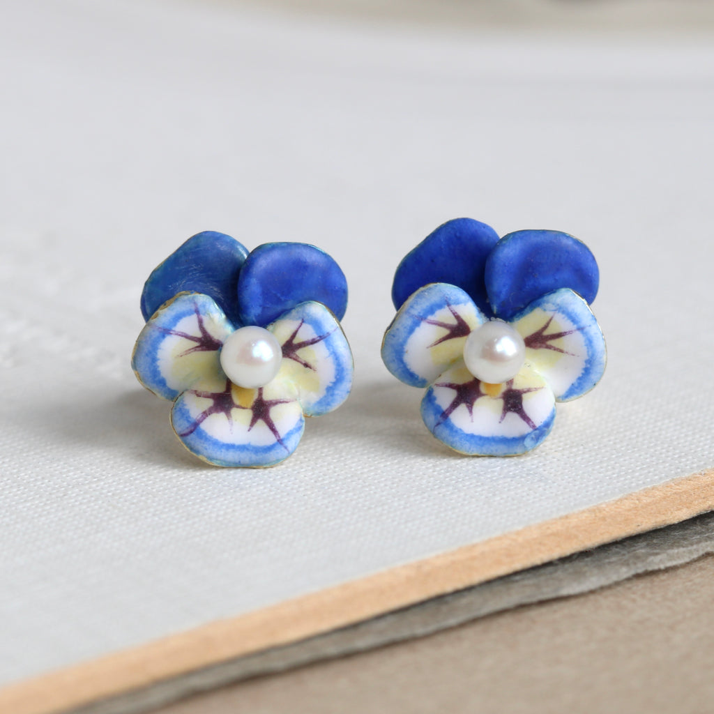miniature blue pansy stud earrings with small pearl centers