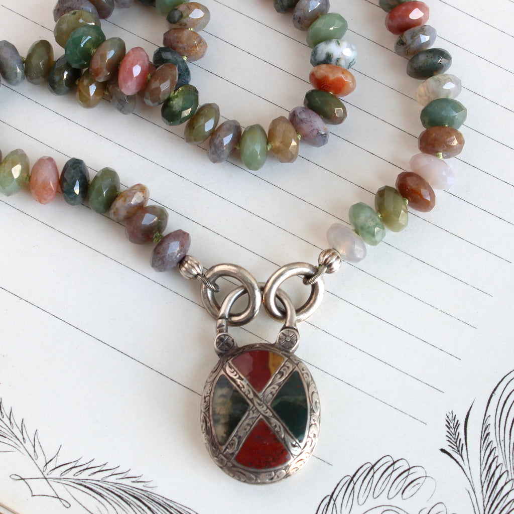 mutlicolor agate beads with an antique silver padlock clasp