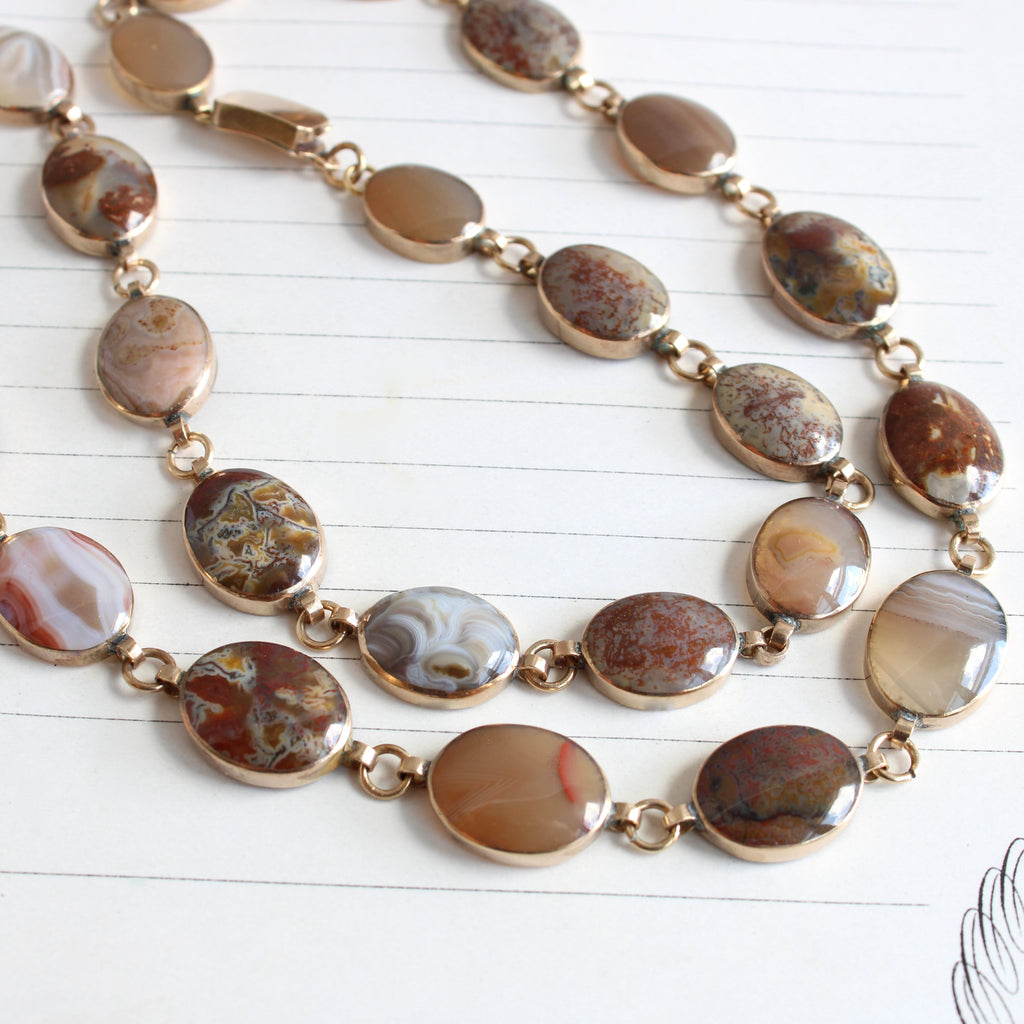 antique necklace of very different agate specimans in smooth bezels
