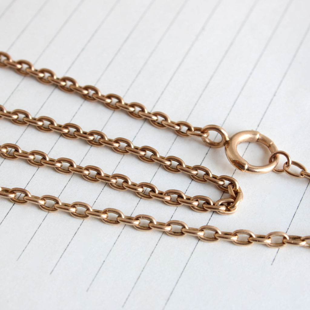 antique rose-tinted yellow gold chain with oval links and a large round clasp