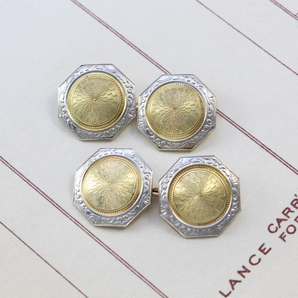 Vintage art deco two tone cufflinks with a white gold octagon border and a yellow gold coin center.