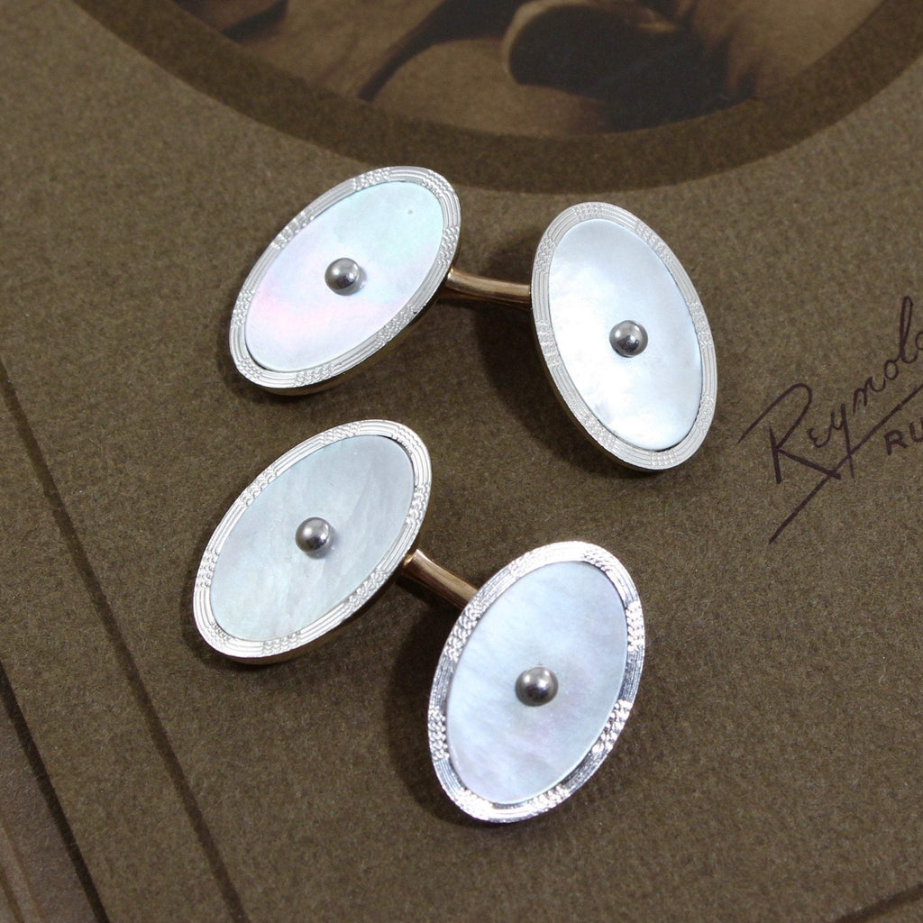 Antique platinum and oval mother of pearl cufflinks.