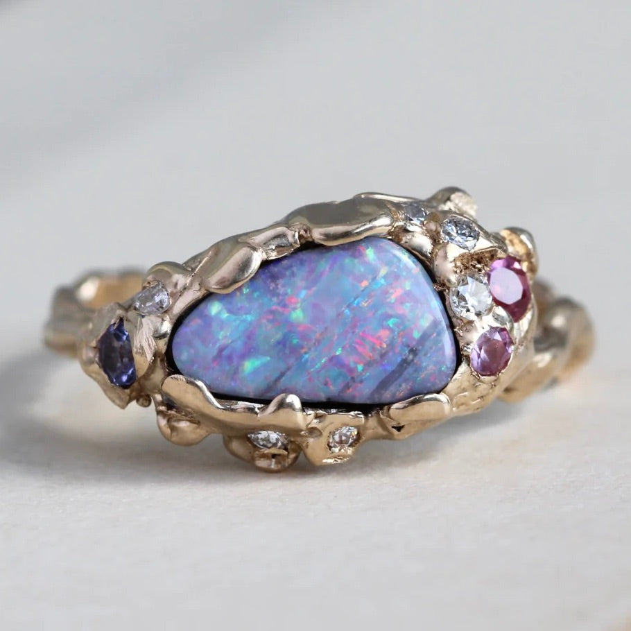 organic branch style yellow gold ring with blue-purple Australian opal and pink sapphires.