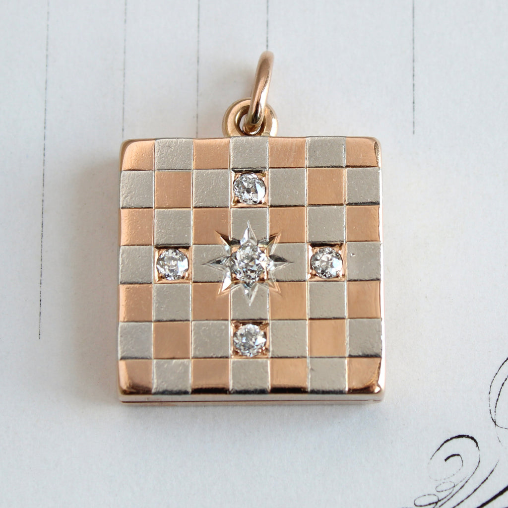 Antique square locket with a checkered rose gold and platinum pattern set with five diamonds 