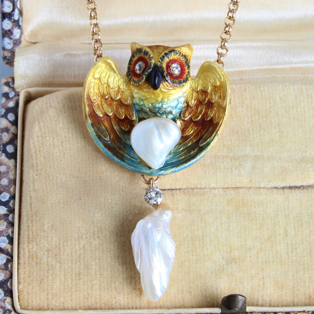 gold owl pendant necklace with gold, orange and teal enamel, diamond eyes and a pearl drop