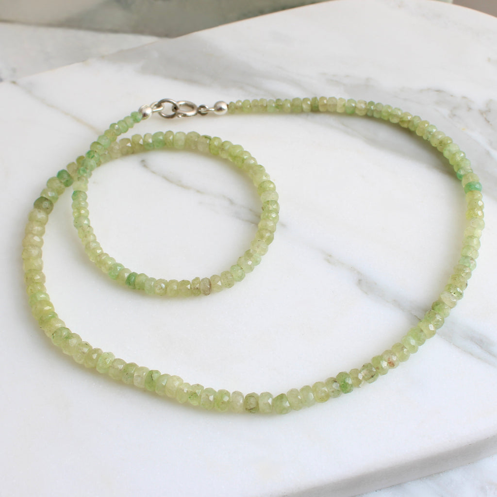 slightly graduated light green emerald bead necklace with silver clasp