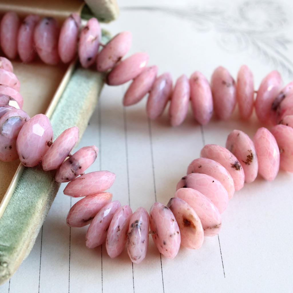 pink peruvian opal bead necklace in a tire cut knotted on pink silk