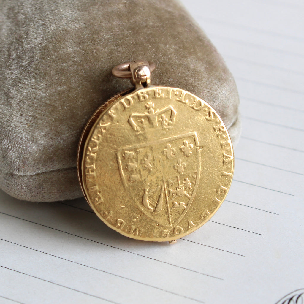 locket made from a gold half guinea coin with a bloodstone back cover