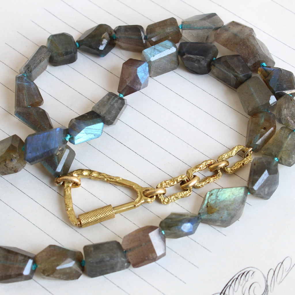labradorite bead necklace in all different geometric shapes with a gold carabiner clasp