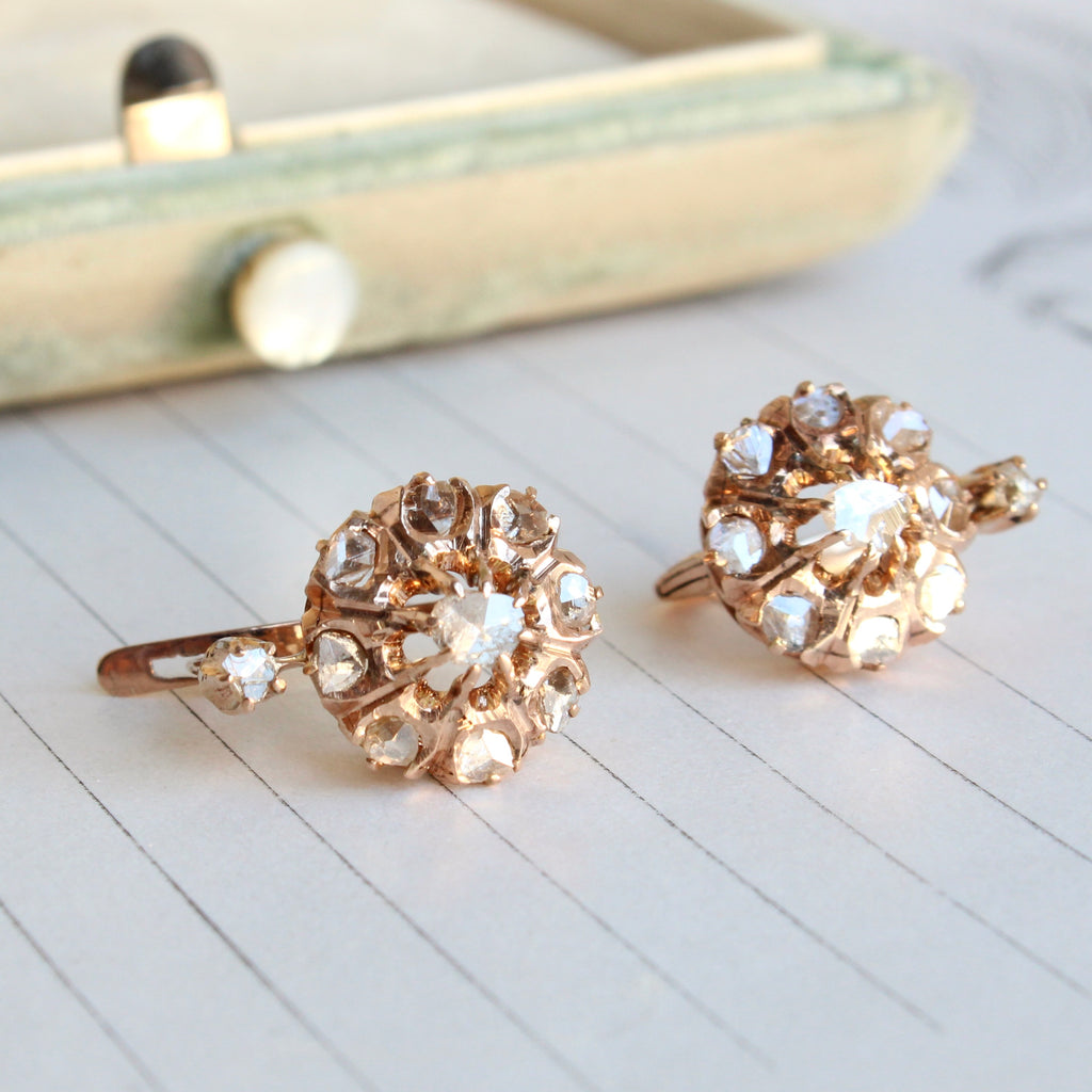 antique cluster earrings set with rose cut diamonds in rose tinted gold with lever backs