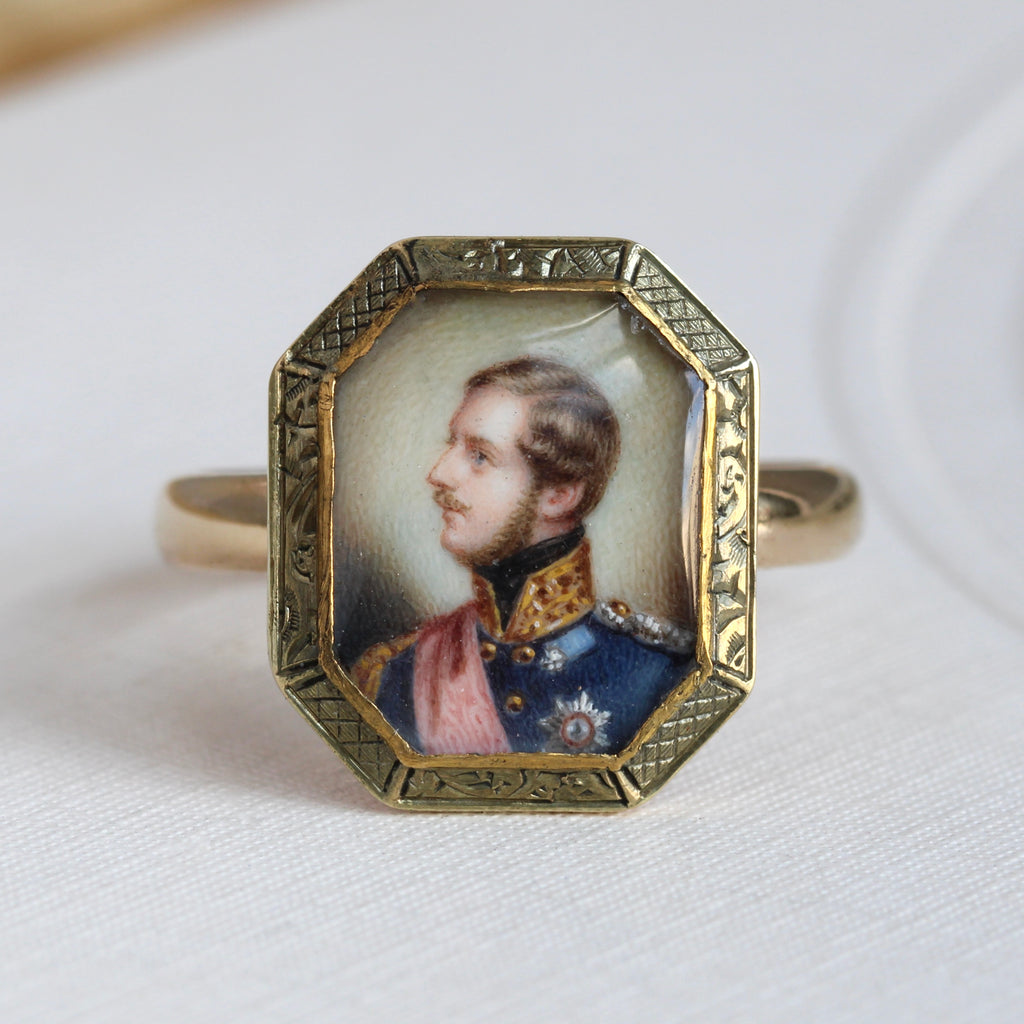 antique yellow gold ring with a hand painted full color miniature portrait of prince albert 