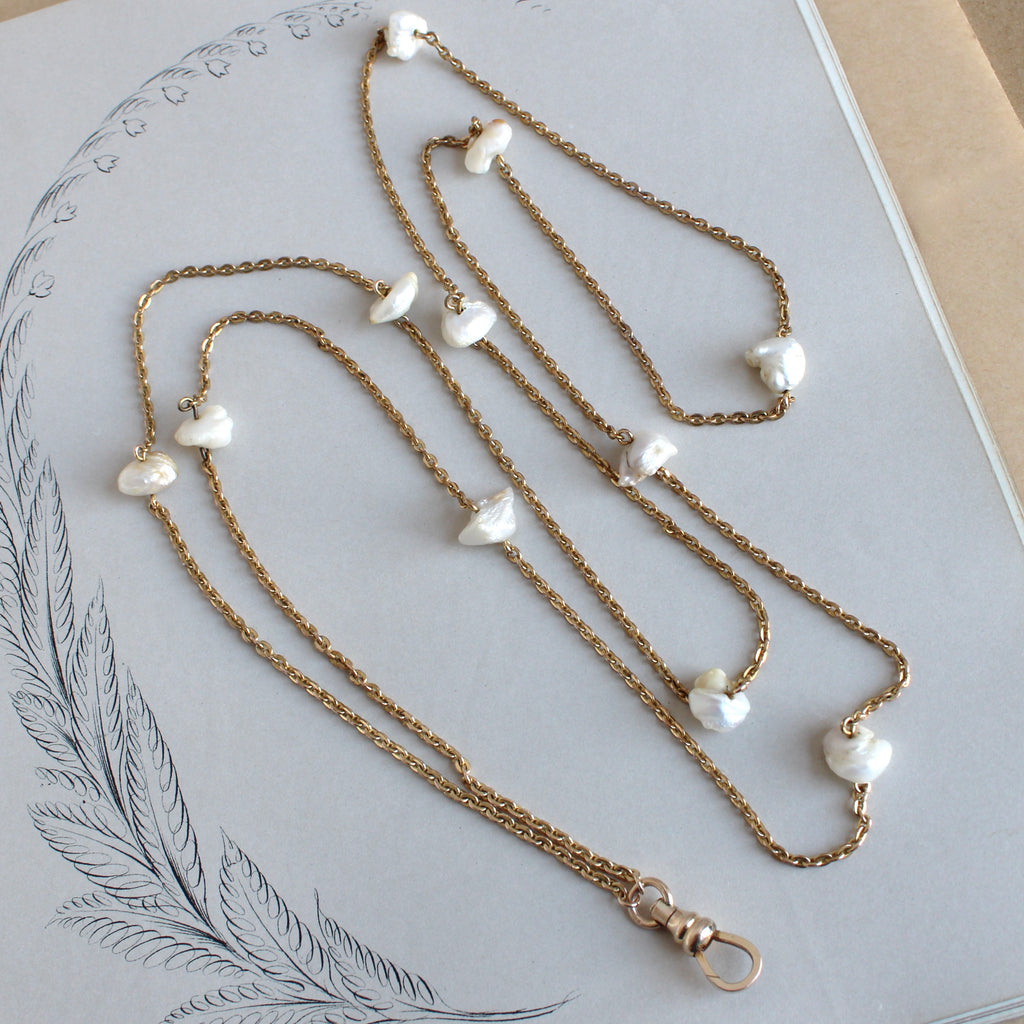 long gold filled chain with baroque pearls at intervals 