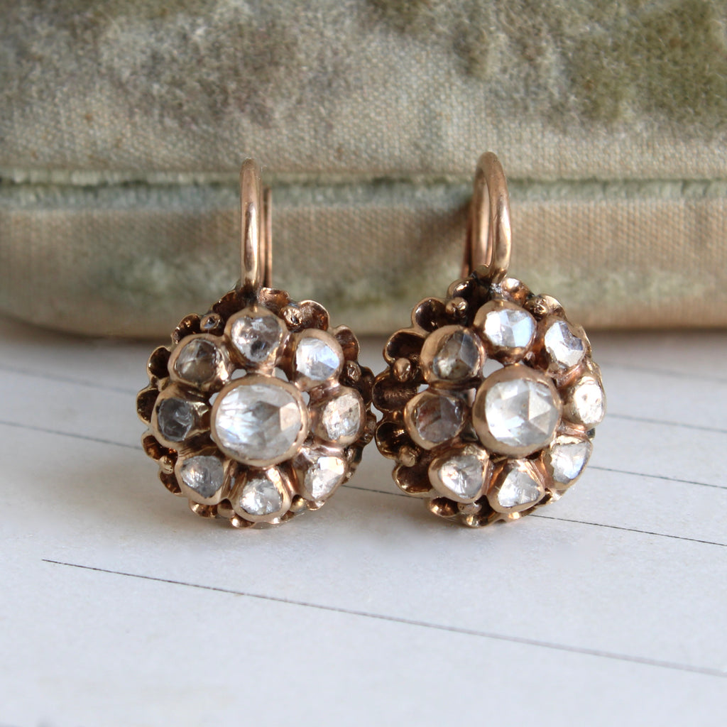 antique gold earrings designed as a daisy flower cluster of rose cut diamonds
