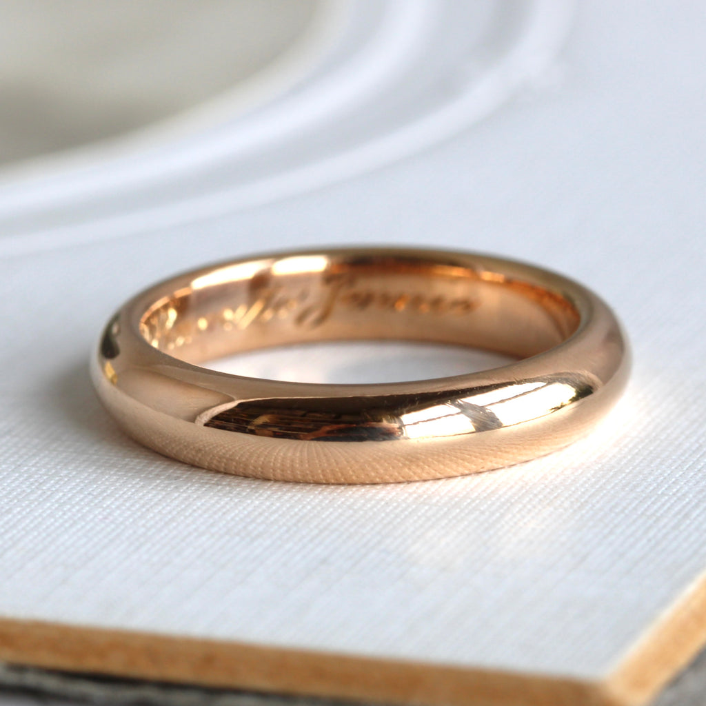 antique rose gold stacking band with a rounded dome profile