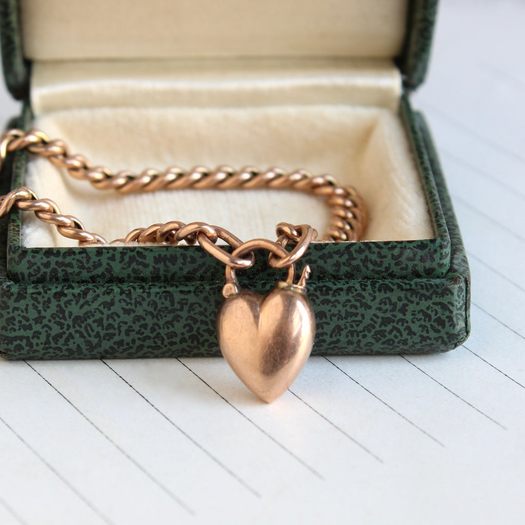 rose gold curb chain with miniature heart shaped padlock clasp