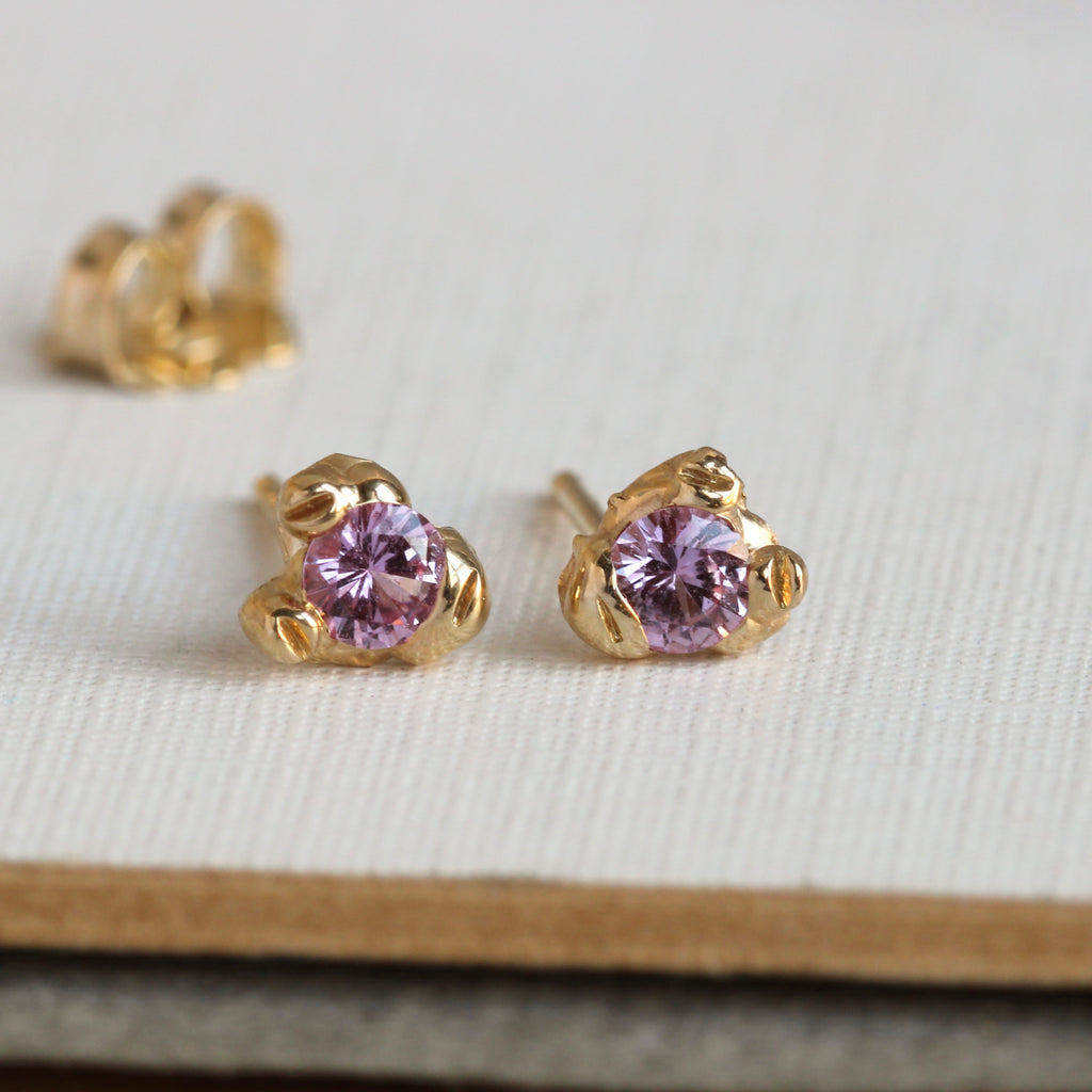 small yellow gold studs with pink sapphires