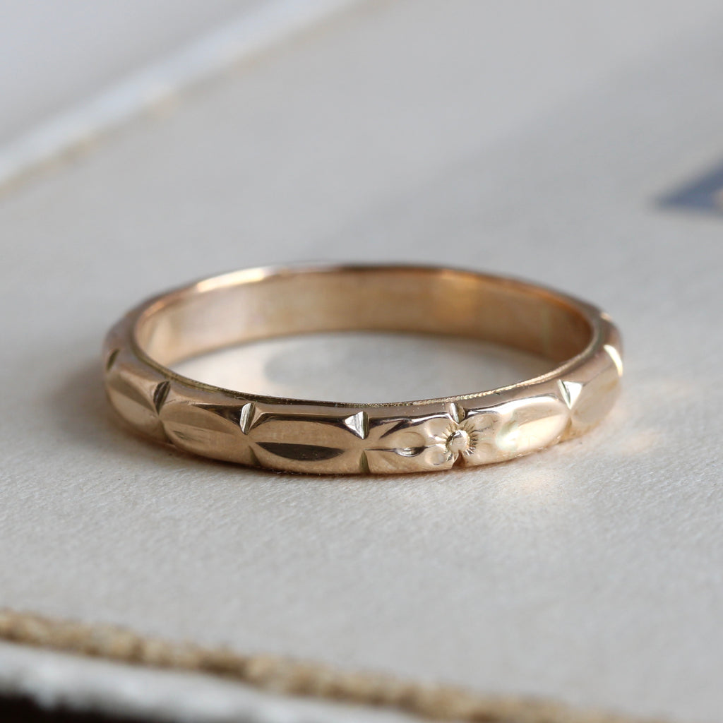 yellow gold band in a large size for men or women with orange blossom flower design