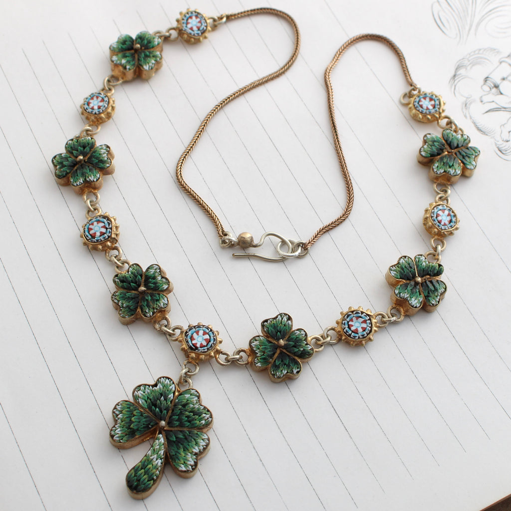 four leaf clover necklace with each clover made of tiny glass tile mosaic