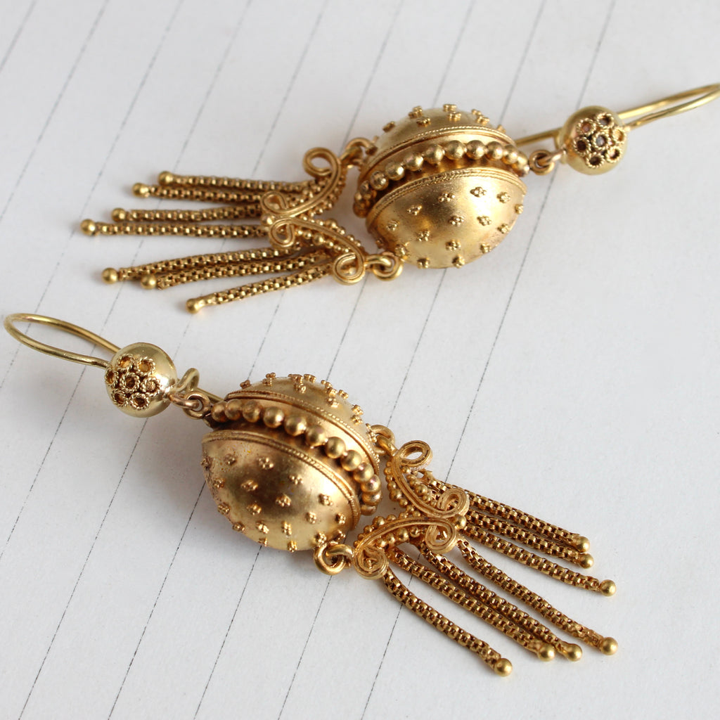 yellow gold earrings with long fringe drops and filigree ball decoration