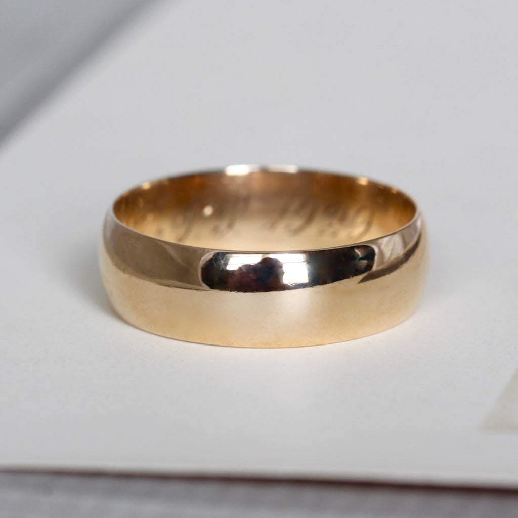 Antique 14k yellow gold wedding band ring with high polish finish.