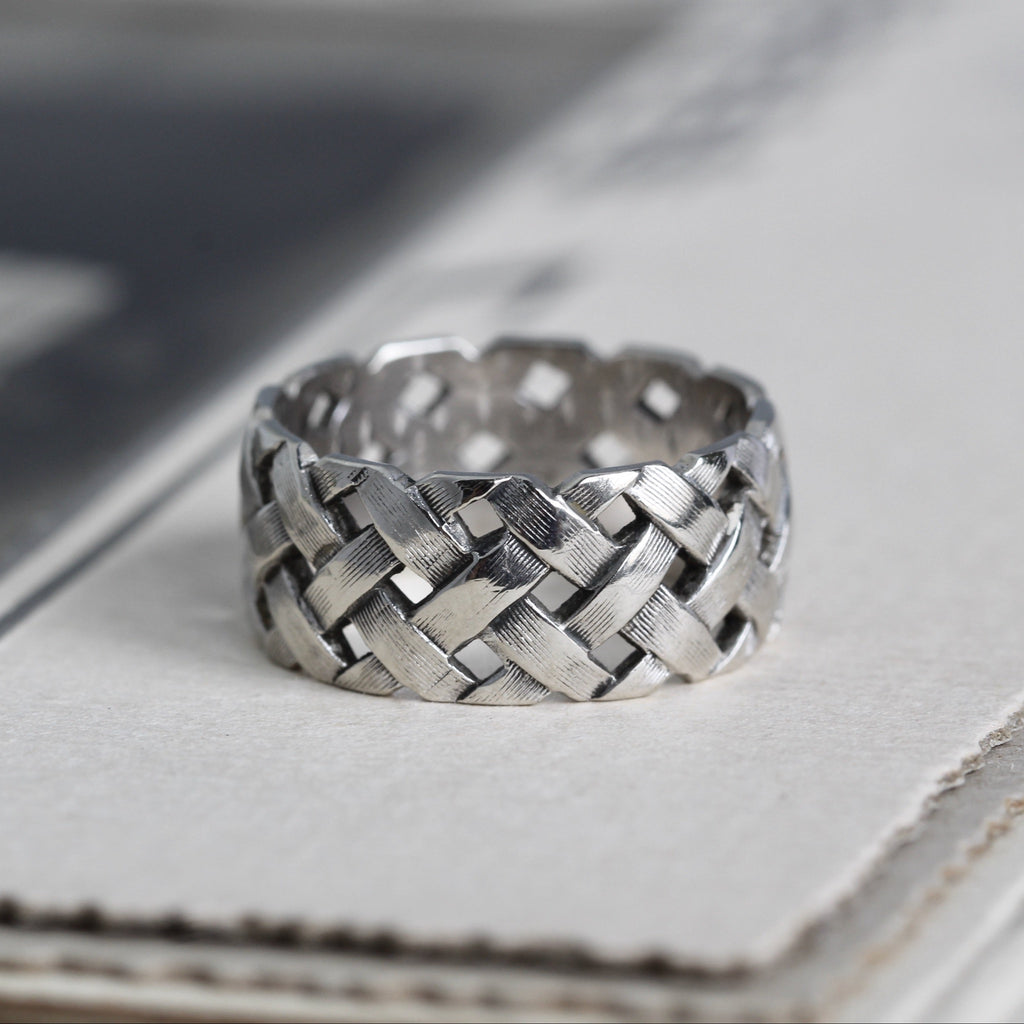 White gold wide wedding band in a basket weave design.